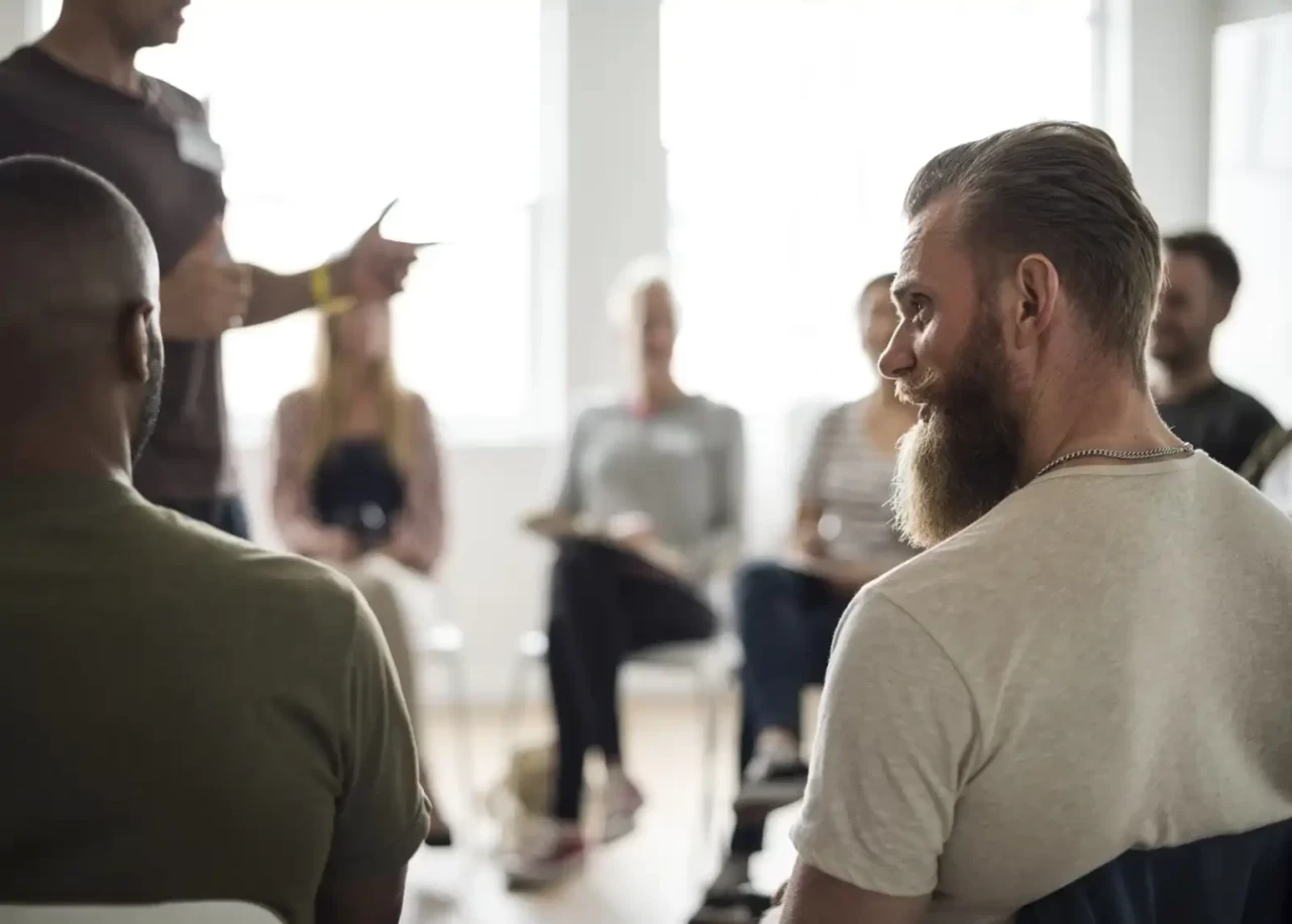 group-conversation-man-standing group-conversation-man-standing
