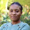 Portrait of Leslie Katambwe, office manager at rehab clinic in South Africa.